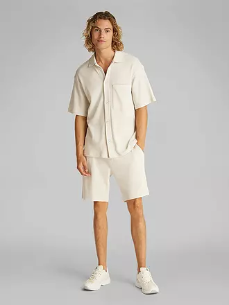 CALVIN KLEIN JEANS | Camicia
Marca: CALVIN KLEIN JEANS
Colore: crema
Categorie: Moda, Uomo

Lunghezza manica: Manica corta
Materiale: Cotone, Poliestere / Poliammide
Forma colletto: Colletto Kent
Motivo: Tinta unita
Vestibilità (capispalla): Regular
Stile: Young Fashion
Dett | 